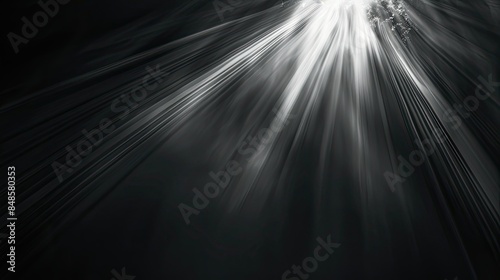 bright rays of light on a black background 