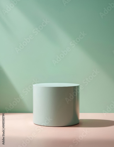 Simple round light green display stand for product showcase on light green background