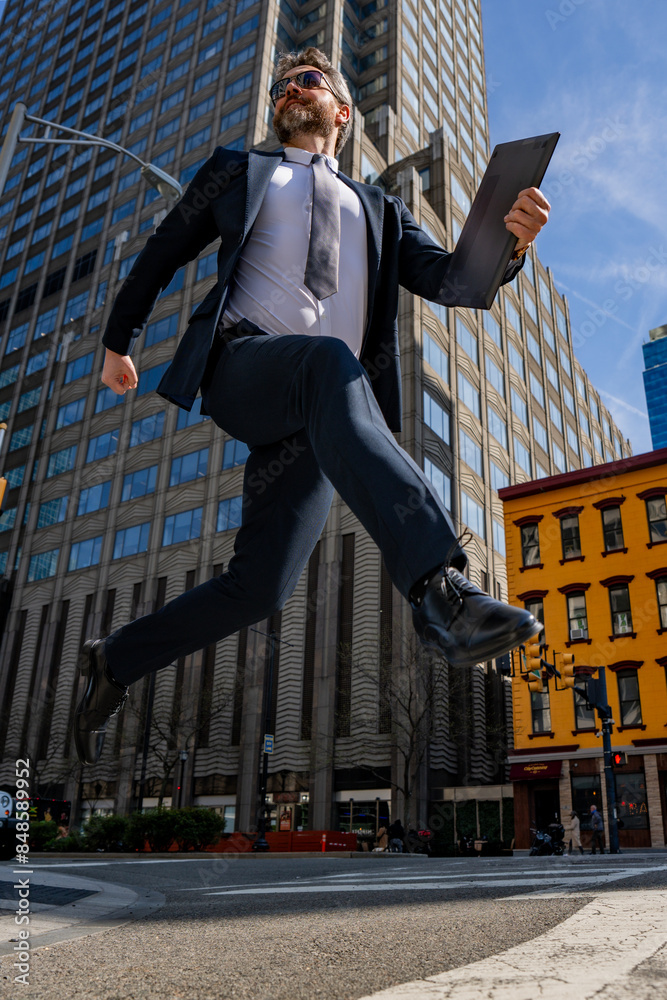 Businessman jumping in the street. Next Jump and Steps. Business Ambitions concept. Goal business success strategy. Creative growth development. Growth jump business success process. Jump Forward. Businessman jumping in the street. Next Jump and Steps. Business Ambitions concept. Goal business success strategy. Creative growth development. Growth jump business success process. Jump Forward.