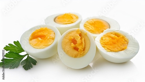 sliced soft boiled eggs on white background photo