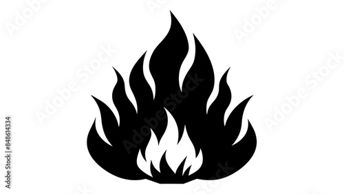 Fiery flames illuminate the darkness. Blazing fire against a dark backdrop. Flames flicker against a dark backdrop.