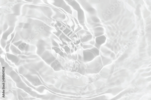 White water with ripples on the surface. Defocus blurred transparent white colored clear calm water surface texture with splashes and bubbles. Water waves with shining pattern texture background.