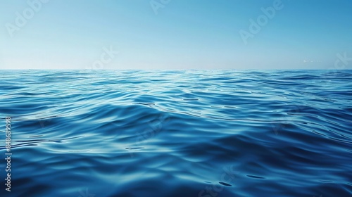 Wallpaper Mural A calm sea water background with rippling waves and clear reflections of the sky, offering a serene and tranquil atmosphere in shades of deep blue. Torontodigital.ca