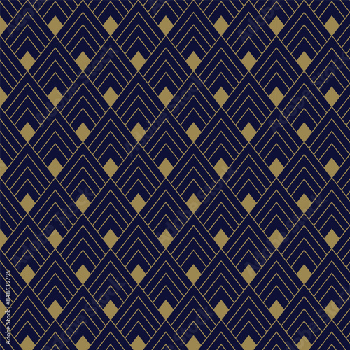 Art Deco chevron pattern background. A striking Art Deco-inspired chevron pattern featuring gold lines on a rich navy background