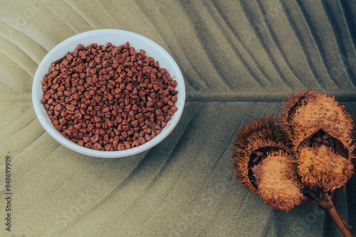 Red annatto seeds powder - Bixa orellana photo