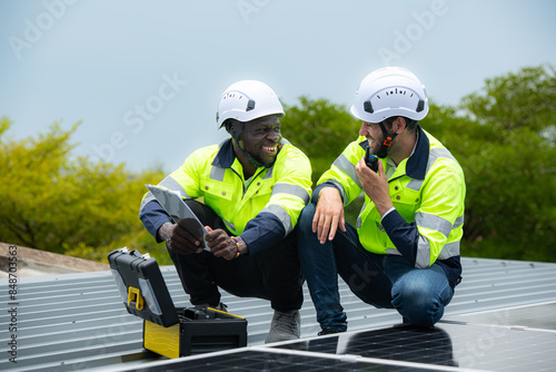 Wallpaper Mural Engineer and technician inspects solar panel installation and test the operation of the panel Torontodigital.ca