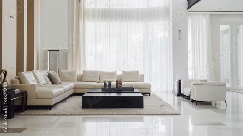 a sleek and elegant living room design embracing modern minimalism, with sparse furnishings against a backdrop of crisp white walls © Goeth