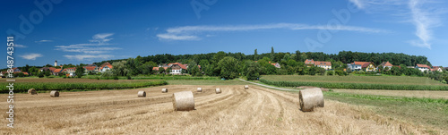 straw rolls on a field near hartberg in the austrian county steiermark photo