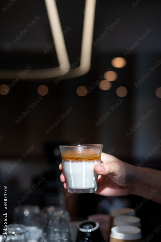 glass of coffee with milk on the table glass of coffee with milk on the table