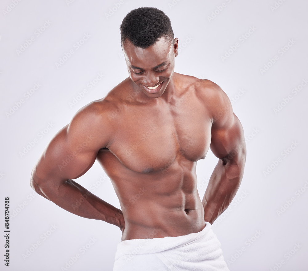 Black man, towel and health for abs in studio, strong arms and muscle on white background. Male person, confident and skin or healthy body for hygiene, sixpack and topless for wellness or fitness Black man, towel and health for abs in studio, strong arms and muscle on white background. Male person, confident and skin or healthy body for hygiene, sixpack and topless for wellness or fitness