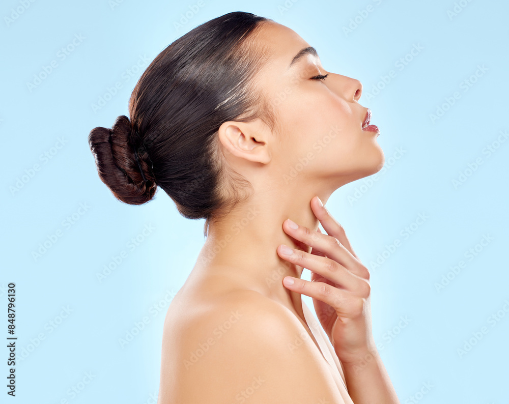 Woman, face profile and beauty with skincare for wellness or health and skin glow with shine in studio. Female person, eyes closed and neck touch for dermatology and cosmetics by blue background Woman, face profile and beauty with skincare for wellness or health and skin glow with shine in studio. Female person, eyes closed and neck touch for dermatology and cosmetics by blue background