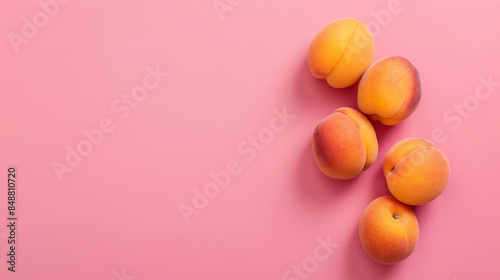 Peaches Fruits on pink background with copy space. Minimal Elegant Summer Healthy Food background.