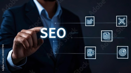 A businessman touching digital word SEO and icons