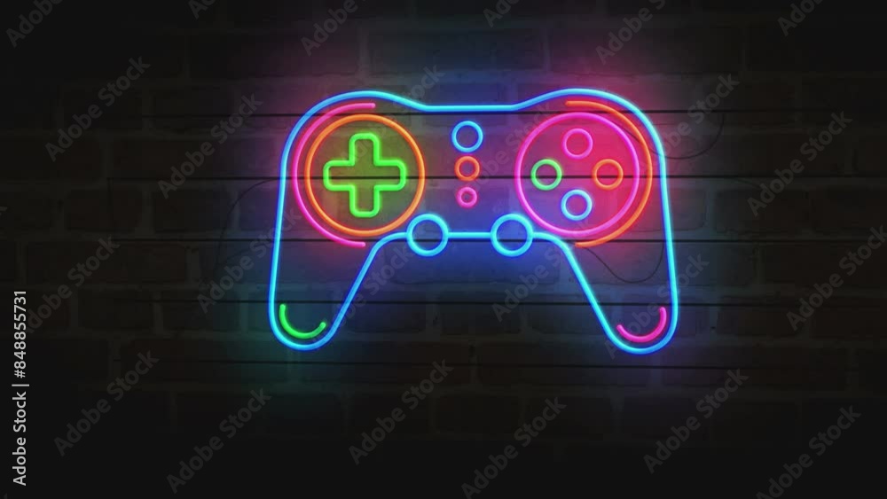 Gaming neon symbol on brick wall. Game pad video retro console light color bulbs abstract concept. Gaming neon symbol on brick wall. Game pad video retro console light color bulbs abstract concept.