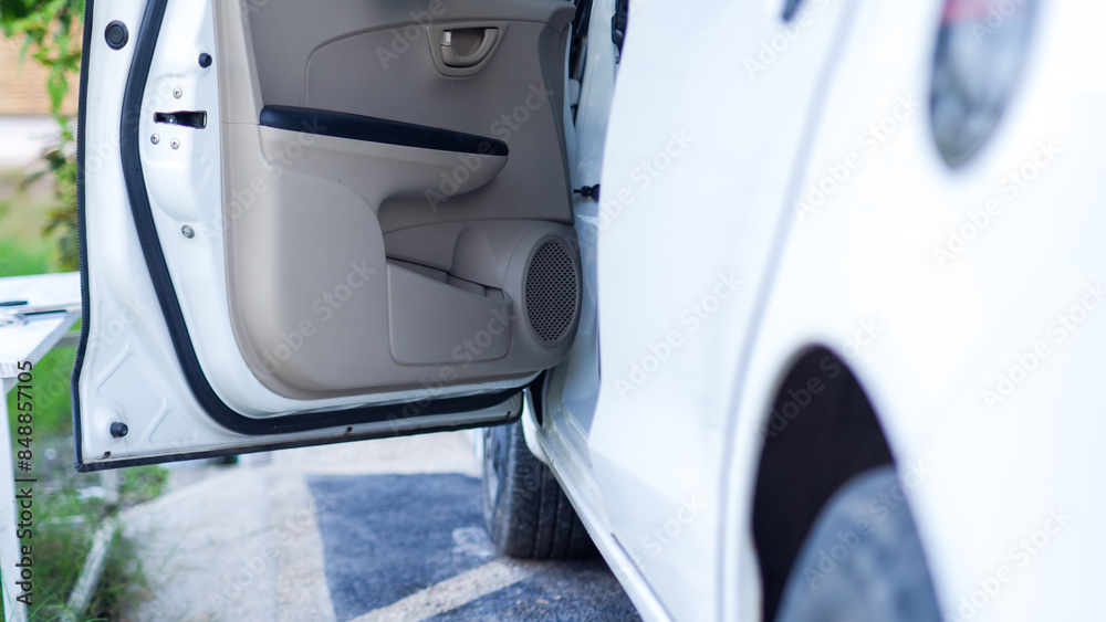 Fototapeta premium car stoped with open door in carport.