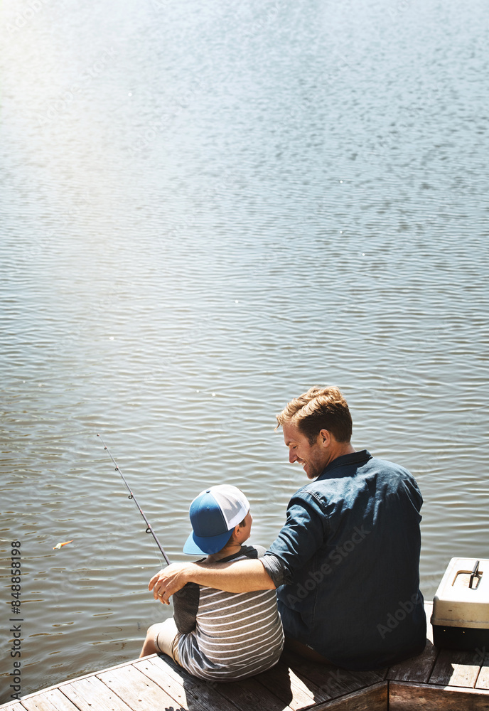Happy father, back and fishing with child by lake, ocean or beach with rod together in nature. Dad with son, kid or little boy with hug for bonding, lesson or tips to catch sea creatures by water Happy father, back and fishing with child by lake, ocean or beach with rod together in nature. Dad with son, kid or little boy with hug for bonding, lesson or tips to catch sea creatures by water