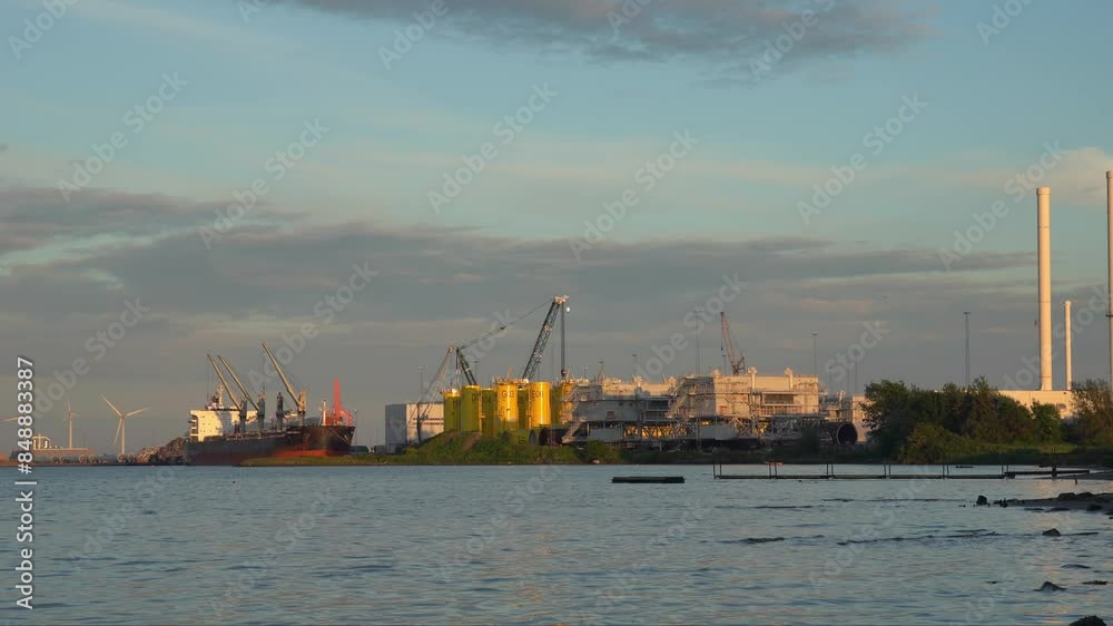 Wind turbinesvnad industrial facility on the shores of Aalborg Wind turbinesvnad industrial facility on the shores of Aalborg