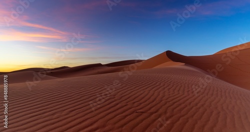 panorama view of the sand dunes at Erg Chebbi in Morocco at sunset
