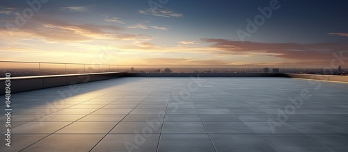 Fototapeta Naklejka Na Ścianę i Meble -  Modern building rooftop on an empty floor set against a picturesque evening sky offers a stunning copy space image