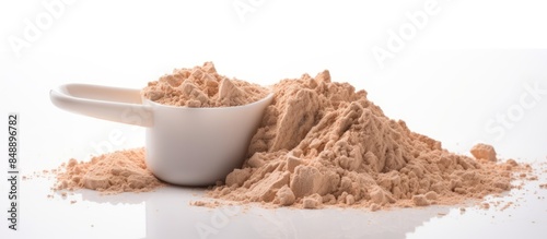 Whey protein powder scoop on a white backdrop with copy space image