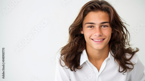 Happy cheerful young latino generation z. Smiling funny ethnic cool generation z teenage student, long hair, white background. © ALA