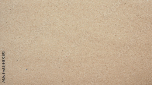 Close-up of Textured Brown Paper Sheet Background