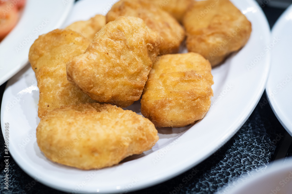 Chicken nuggets is frozen chicken snacks made from selected pure chicken meat. Ready-to-eat snacks, just fry. Contains protein from chicken meat. Chicken nuggets is frozen chicken snacks made from selected pure chicken meat. Ready-to-eat snacks, just fry. Contains protein from chicken meat.