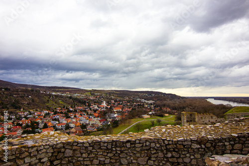 Devín city with cozy small buildings with red tiles. It is an important archaeological site situated near the ruins of Devín Castle photo