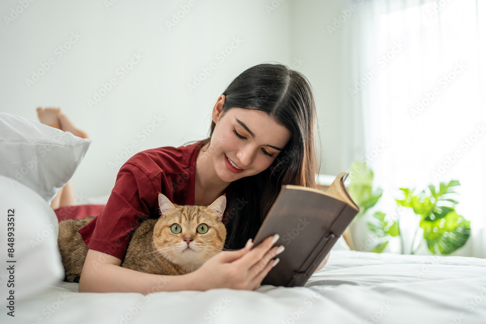 Asian woman holding and play with little cat with happiness at home. Asian woman holding and play with little cat with happiness at home.