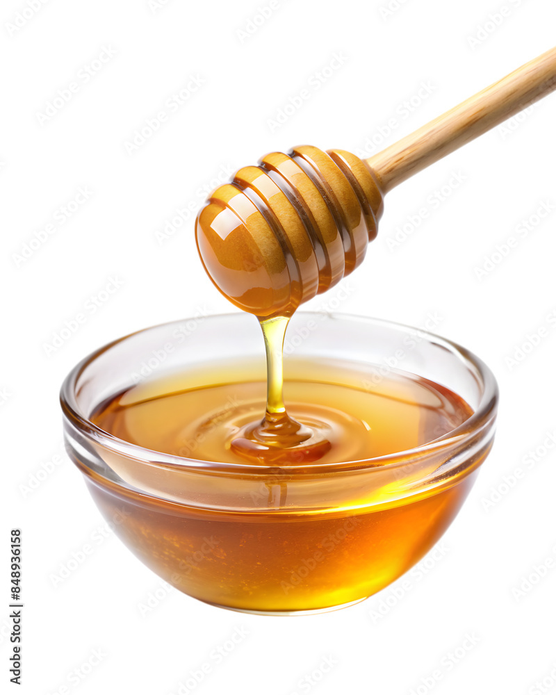 Golden Honey Dripping into Glass Bowl Golden Honey Dripping into Glass Bowl