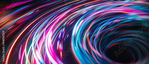A striking swirl of colorful light trails, creating a dynamic and futuristic vortex, showcasing a vibrant whirl of motion and energy.