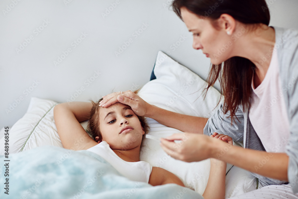 Mother, girl child and sick in bedroom with hand for check on fever, parent with healthcare for daughter. Mom, kid and medical care in home for FLiRT Covid, support or help for virus with headache Mother, girl child and sick in bedroom with hand for check on fever, parent with healthcare for daughter. Mom, kid and medical care in home for FLiRT Covid, support or help for virus with headache