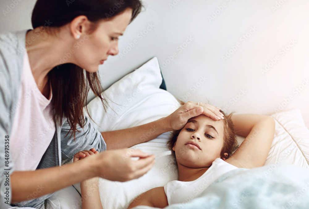 Mom, girl child and sick in bedroom with hand for check on fever, parent with healthcare for daughter. Mother, kid and medical care in home for FLiRT Covid, support or help for virus with headache Mom, girl child and sick in bedroom with hand for check on fever, parent with healthcare for daughter. Mother, kid and medical care in home for FLiRT Covid, support or help for virus with headache