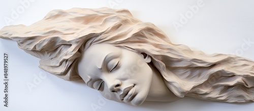 Clay sculpture on white backdrop suitable for molding Wet clay medium for sculpting with copy space image