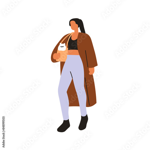 Woman walking with cute cat in bag. Outdoor stroll with adorable funny kitten...