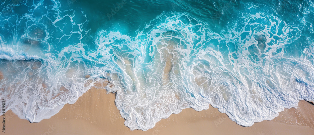 Aerial view of white sand beach with gentle waves, ideal for summer vacations. Aerial view of white sand beach with gentle waves, ideal for summer vacations.