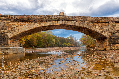 The ancient stone bridge near the village of Dakhovskaya in the Republic of Adygea. photo