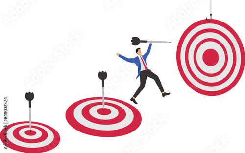 Achieve business target by completing work, goals accomplished concept, task management to achieve career success, businessman jumping while carrying darts to stick into the dartboard to achieve goals