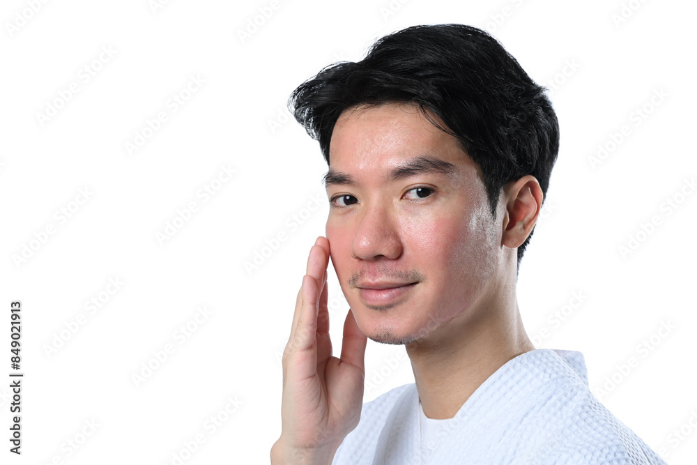 Handsome man wearing bathrobe touching his face isolate on white background. Skin care and beauty treatment concept Handsome man wearing bathrobe touching his face isolate on white background. Skin care and beauty treatment concept