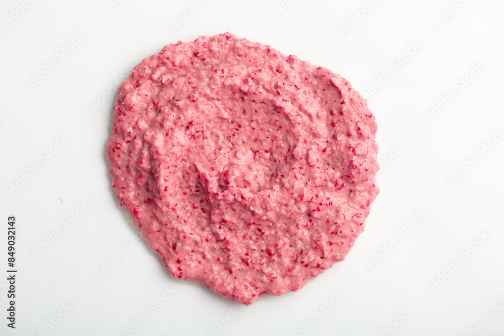 Obraz premium Berry yoghurt ice cream close-up on a white background.. Smoothies from fresh fruits and berries. Ice cream texture. Delicious sweet dessert close-up as a background.