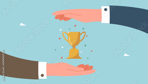 Leadership to achieve highest result, teamwork to find the right strategy and business prosperity, cooperation and partnership to achieve goals and win, large hands protect the winning trophy.