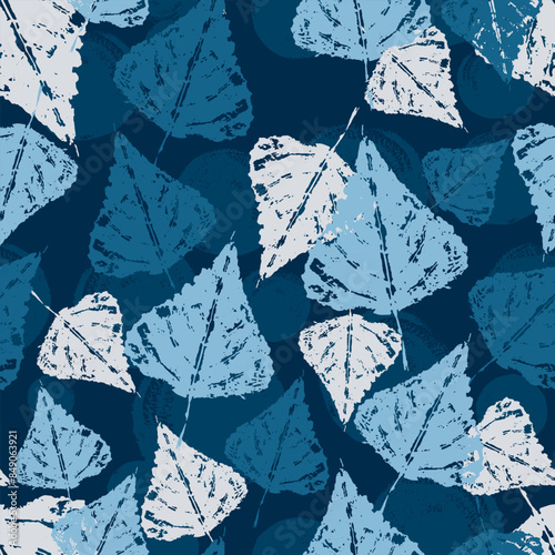 Imprints of poplar leaves in blue colors seamless pattern on textured dark background. Template for fabric, wallpaper, surface design. Vector illustration.