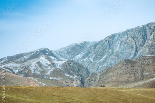 Ganjia Secret Realm, Gannan Tibetan Autonomous Prefecture, Gansu Province - grassland under the snow-capped mountains photo