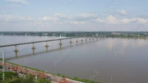 Wallpaper Mural Aerial view of Thai Laos bridge with Mekong River with green mountain hill. Nature landscape background in Ubon Ratchathani, Thailand. Torontodigital.ca