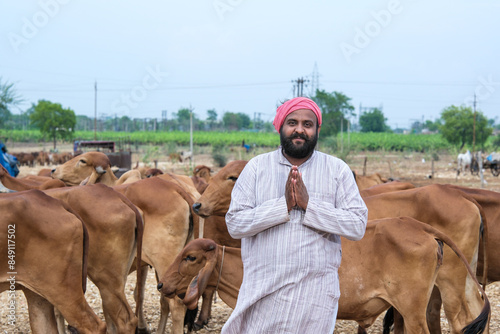Young Indian Farmer and His Dairy Cows