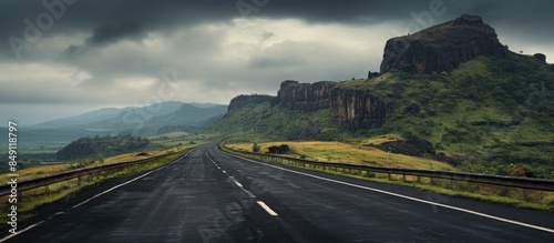 asphalt road going toward raigad fort maharashtra with shallow depth of field. Creative banner. Copyspace image photo