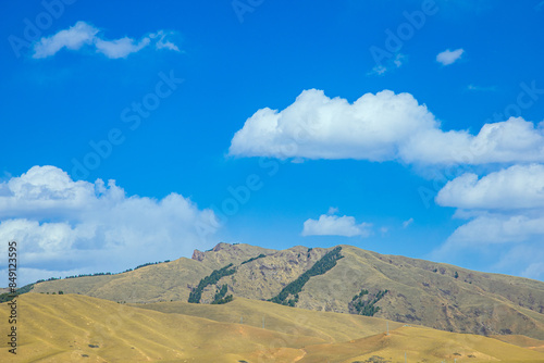 Aba, Sichuan Province - mountains and grasslands under the blue sky