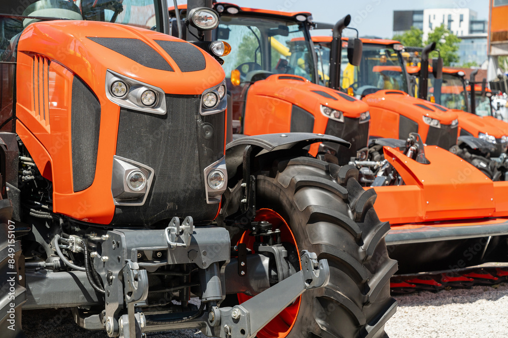 Row of agriultural tractors for sale Row of agriultural tractors for sale