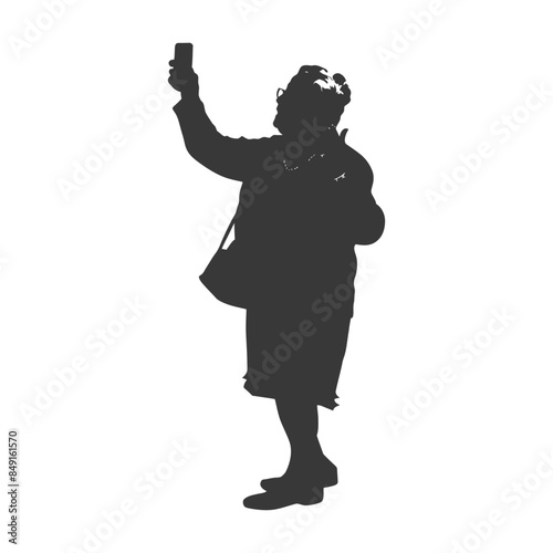 Silhouetted Tourist: Elderly Woman Taking Selfie with Phone