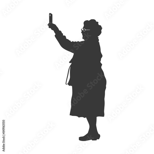 Silhouette of Senior Woman Taking a Selfie with Smartphone.
